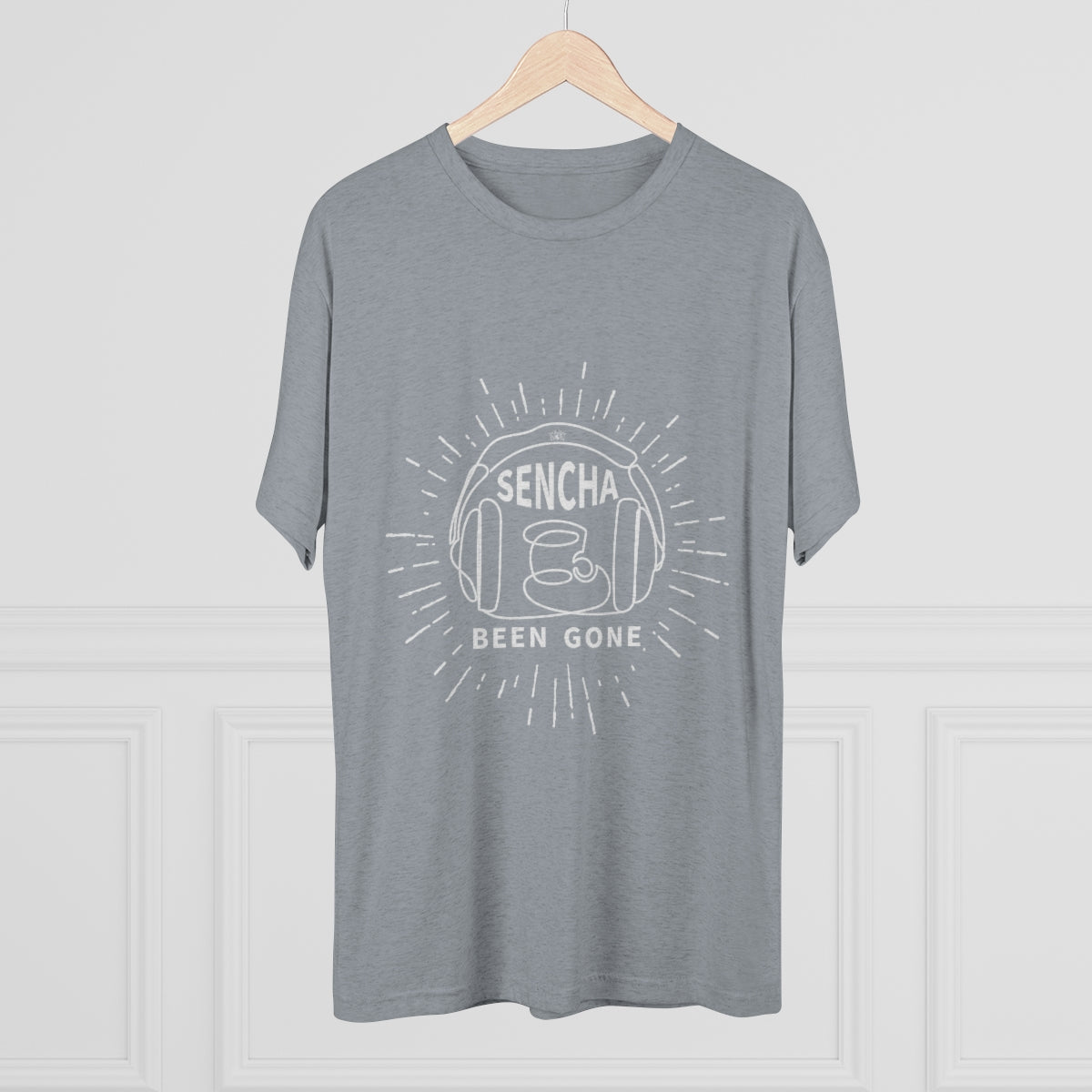 Gray graphic tee featuring "Sencha Been Gone" text and a tea cup design, hanging on a wooden hanger.