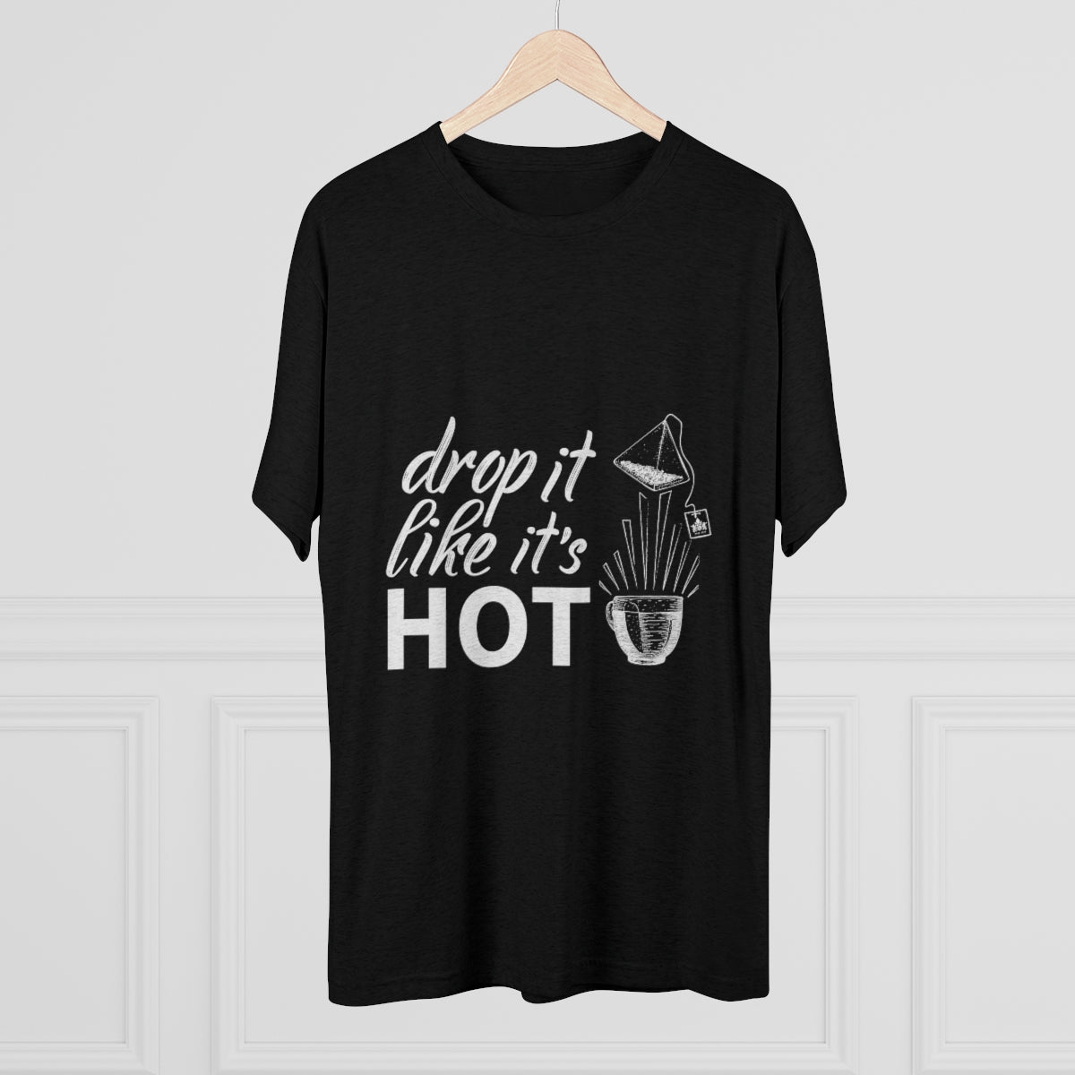 Black graphic tee featuring the phrase "drop it like it's HOT" with a stylish design. Perfect for casual wear.