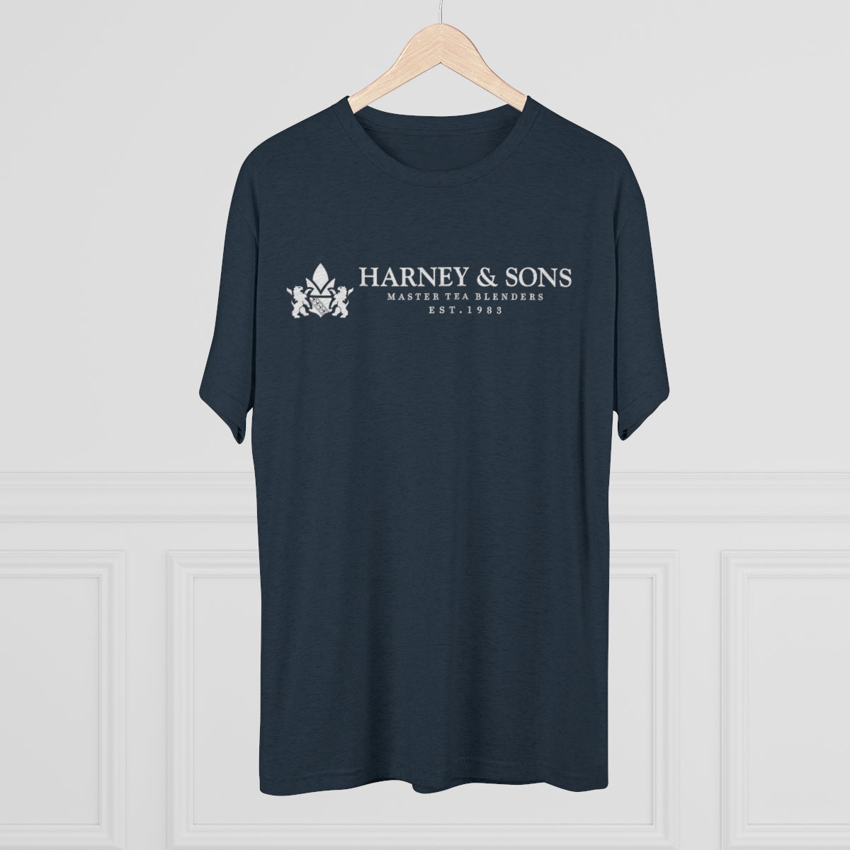 Navy graphic tee featuring "Harney & Sons Master Tea Blenders Est. 1983" logo on the front.