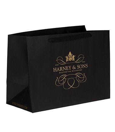 Large black shopping bag from Harney & Sons, featuring gold logo and elegant design. Perfect for tea lovers.