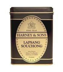 Black tin container of Harney & Sons Lapsang Souchong tea, featuring a gold label and elegant design.