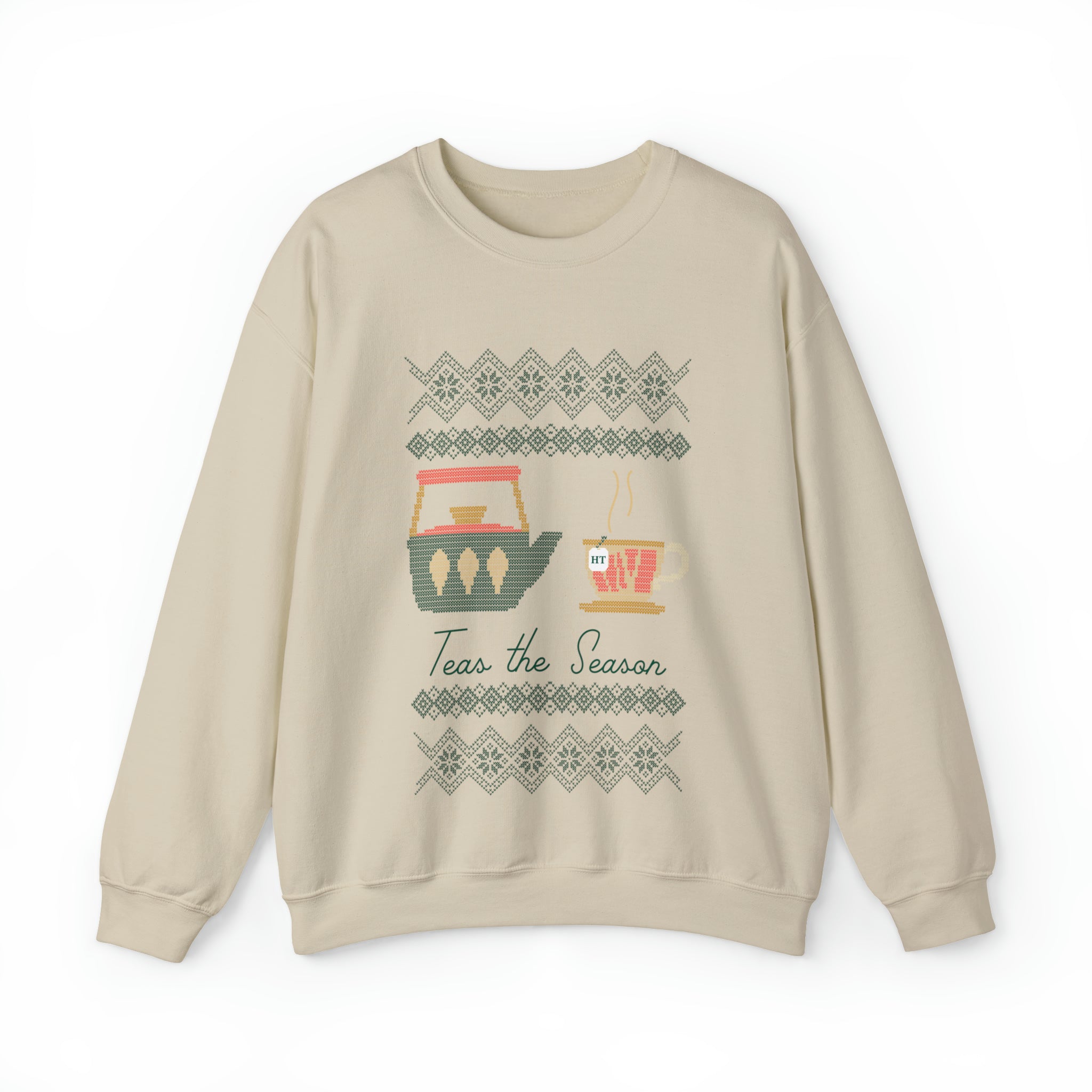 Beige holiday sweater featuring a festive design with teapots and the phrase "Teas the Season." Perfect for winter.
