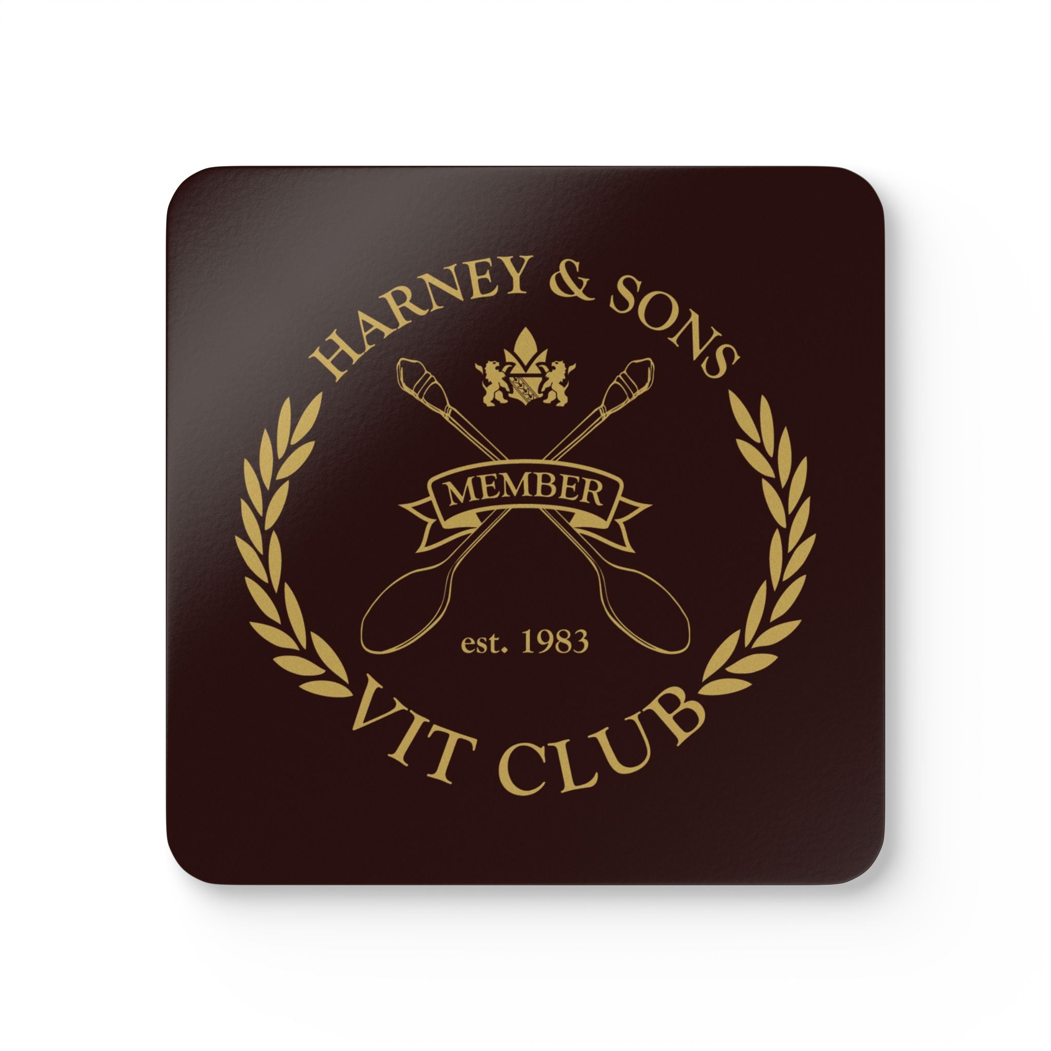 VIT Club Corkwood Coaster Set featuring a gold emblem with crossed spoons and laurel design.