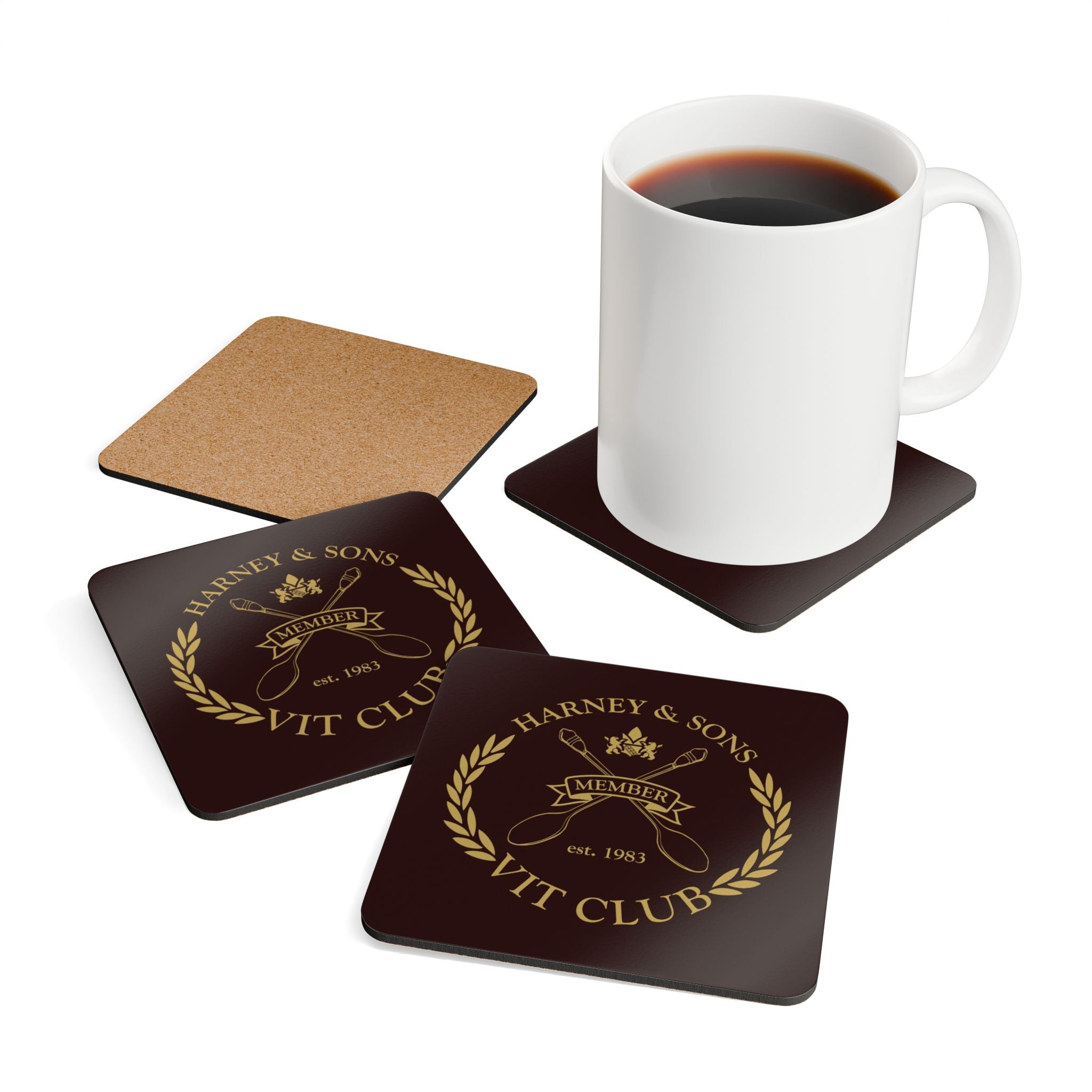VIT Club Corkwood Coaster Set featuring a coffee mug and elegant coasters with a vintage design.