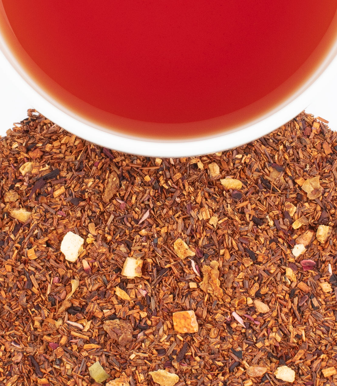 A bag of 50 African Autumn tea sachets with a cup of brewed tea and loose tea blend in the foreground.