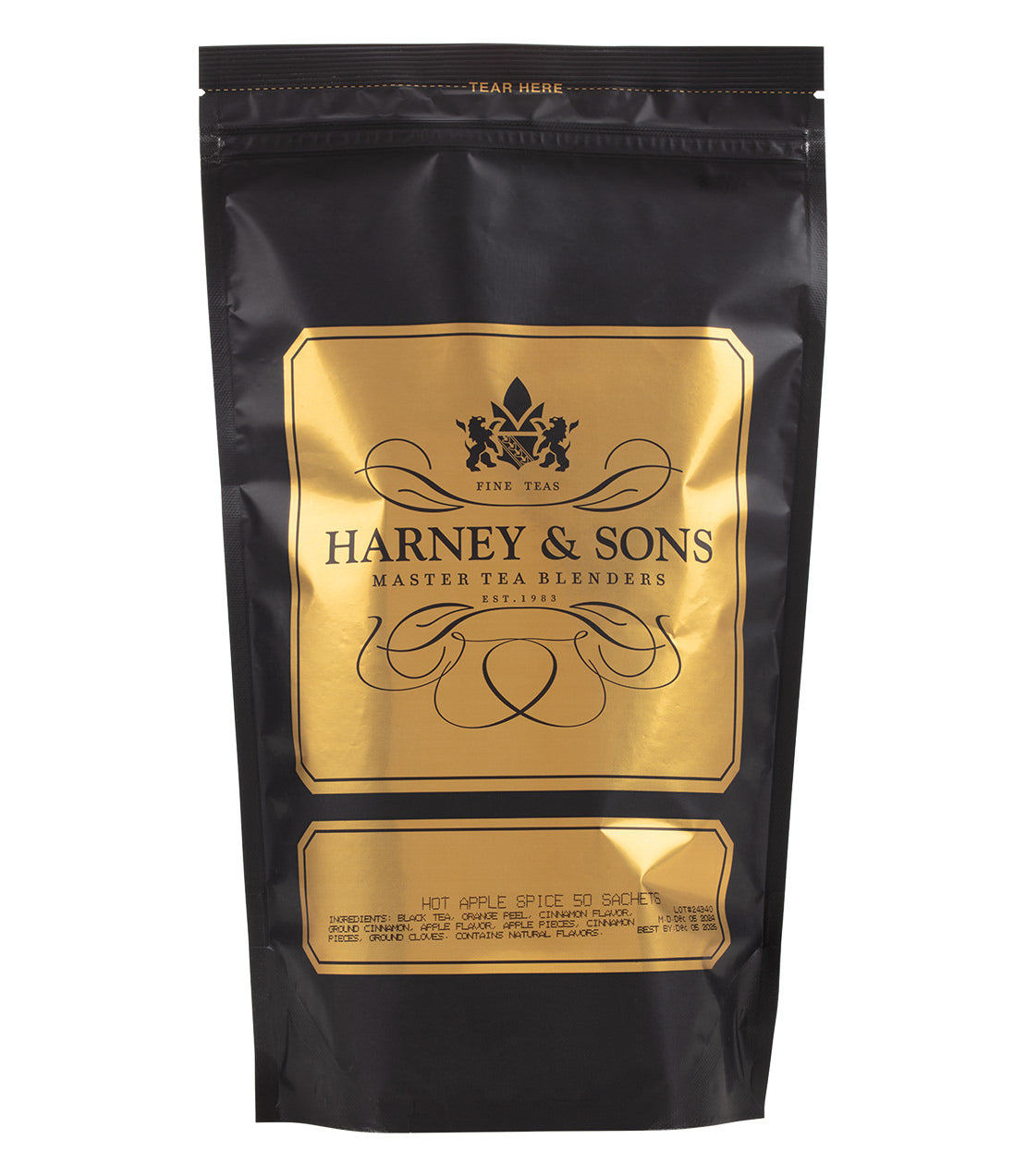 Harney & Sons Hot Apple Spice tea packaging, featuring a black bag with gold accents and elegant branding.