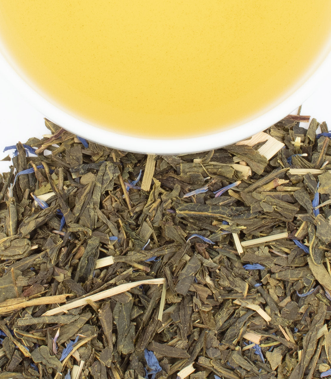 Blueberry Green HRP tea sachets with loose green tea leaves and a cup of brewed tea on a white background.