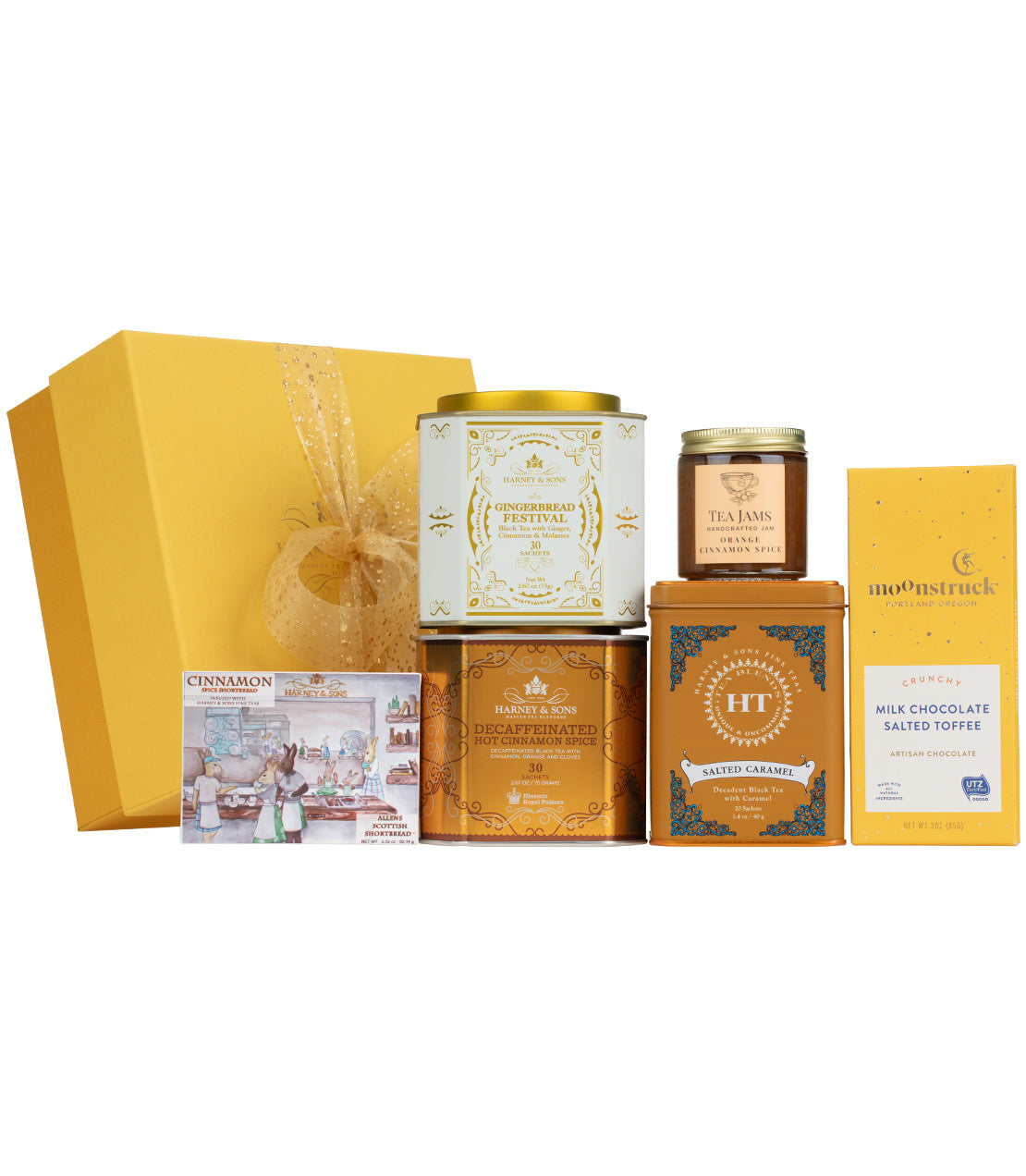 Glorious Gingerbread Gift set featuring assorted treats in a decorative yellow box with a ribbon.