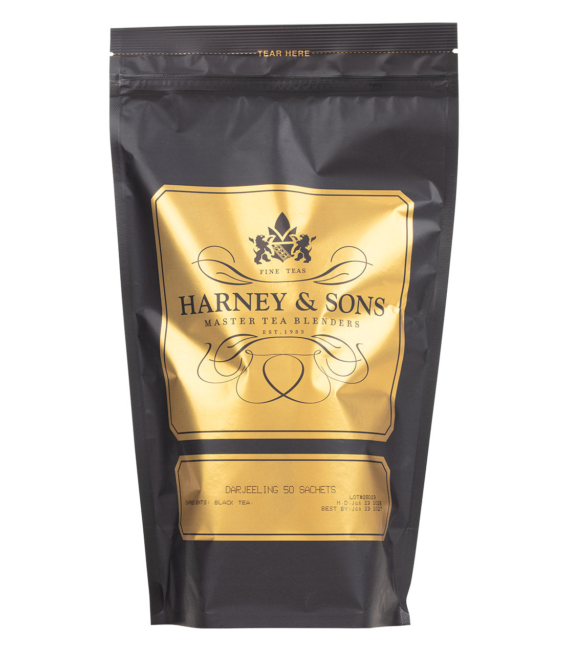 Black tea sachets from Harney & Sons, featuring Darjeeling blend, packaged in a sleek black and gold bag.