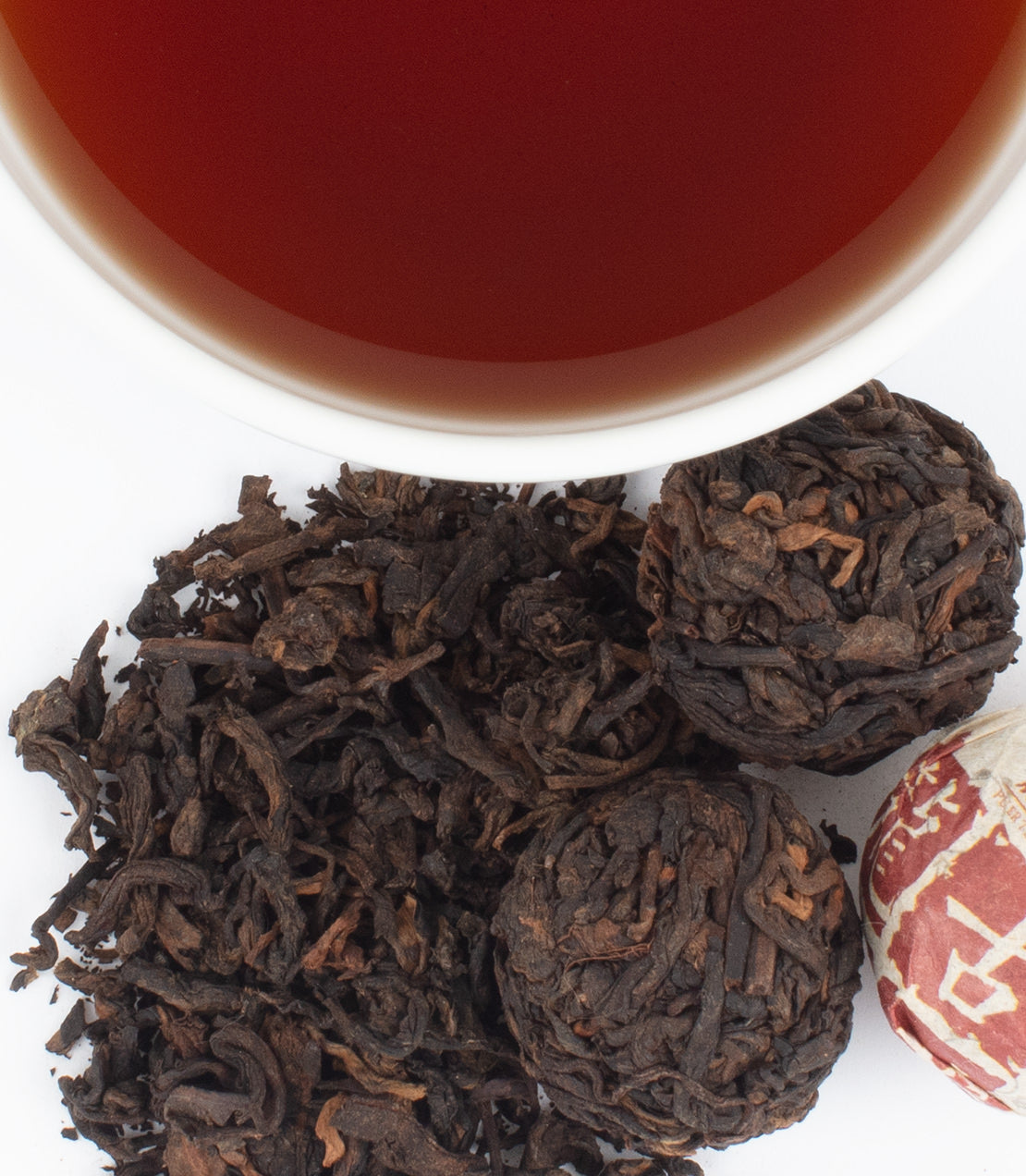 Harney & Sons Fine Teas- 2019 Raw (Sheng) Pu-Erh- Cup and leaves from above