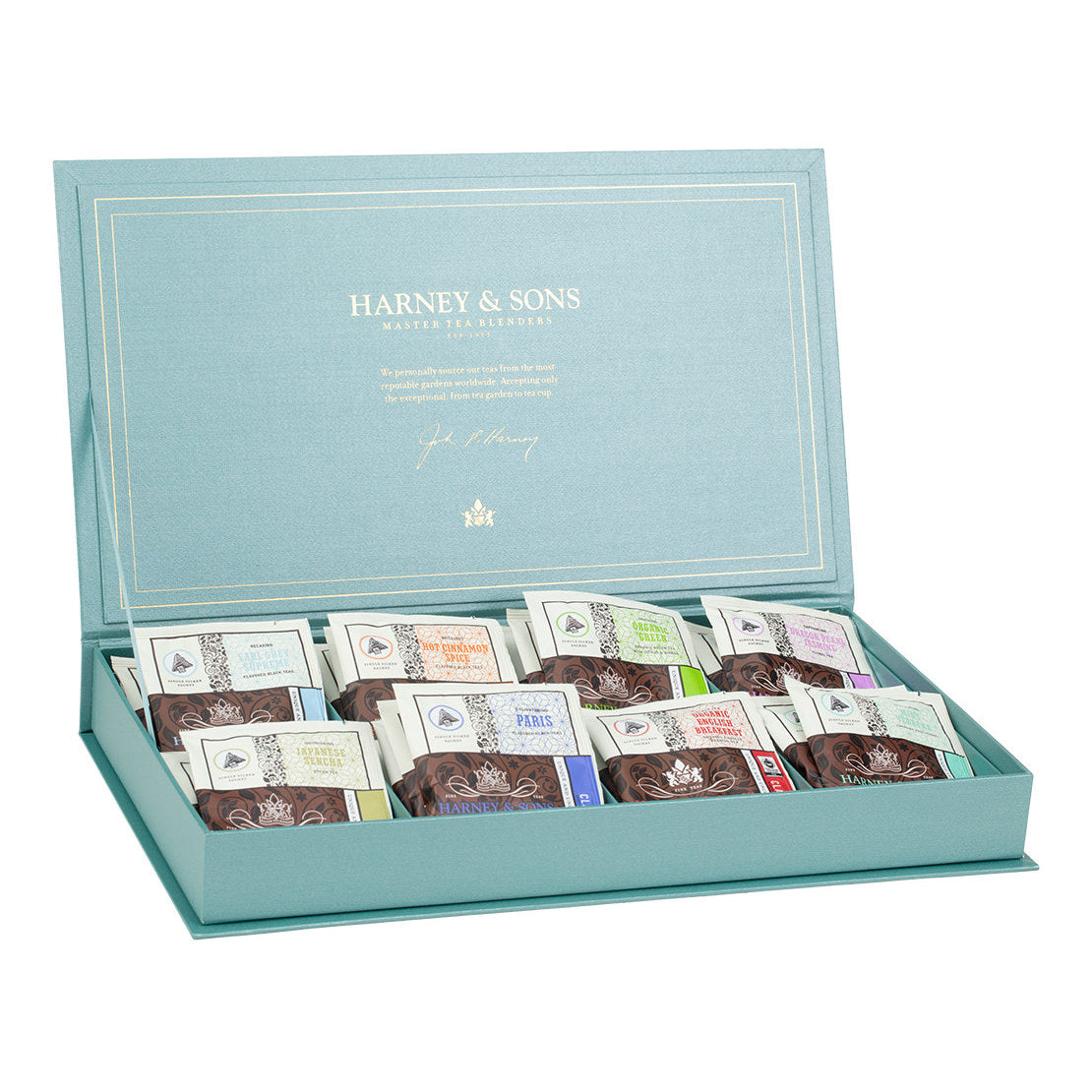 Harney & Sons tea chest with eight assorted tea varieties in elegant packaging, open to display contents.