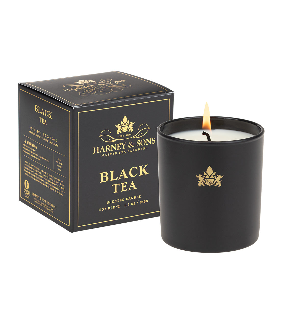 Harney & Sons Black Tea scented candle in a sleek black container with a gold logo, packaged in a decorative box.