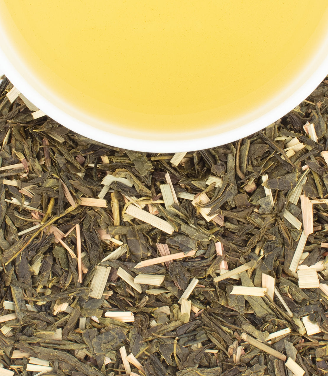 Harney & Sons Fine Teas- Green Tea with Coconut- featuring a blend of green tea and lemongrass, with brewed tea in a cup above.