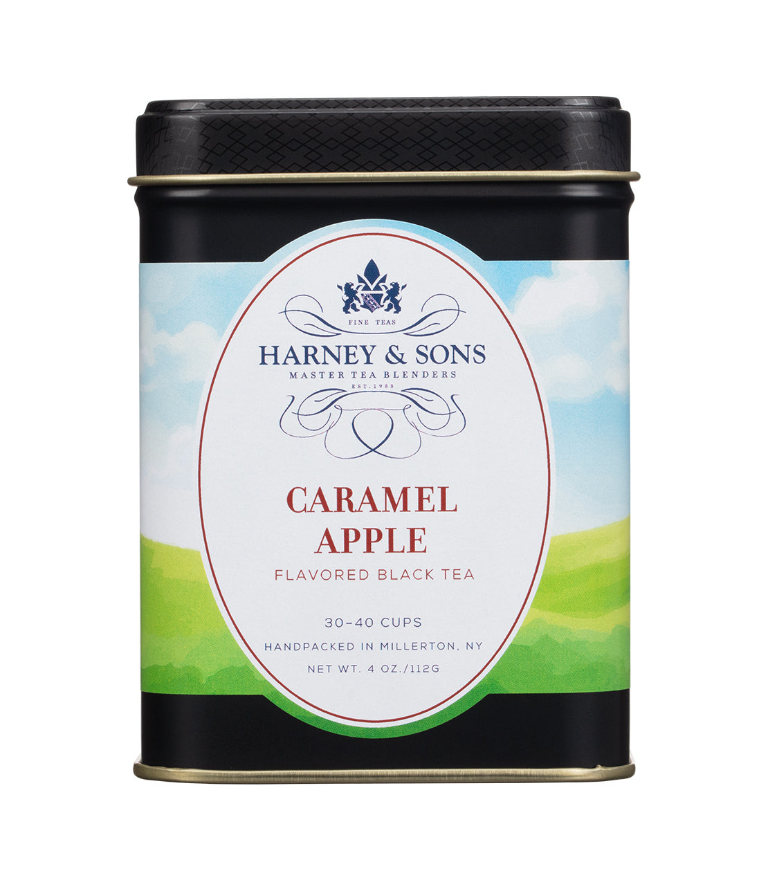 A 4 oz metal tin of Harney & Sons Caramel Apple Flavored Black Tea, featuring a black lid and base with a white, blue, and green landscape label.