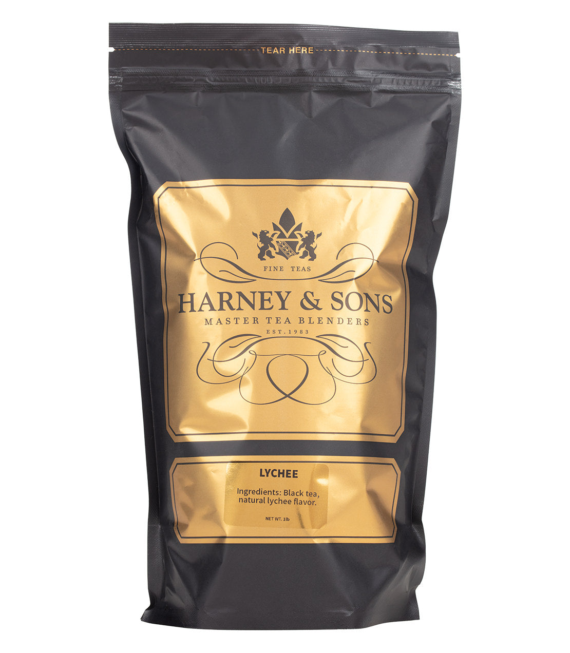Black packaging of Harney & Sons Lychee tea, featuring gold accents and a tear-off top, 1 lb size.