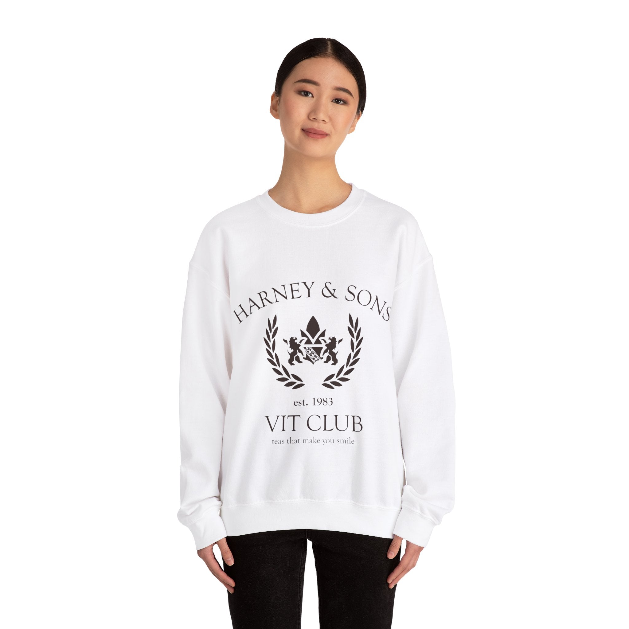 Unisex white crewneck sweatshirt featuring "Harney & Sons VIT Club" graphic design. Ideal for casual wear.