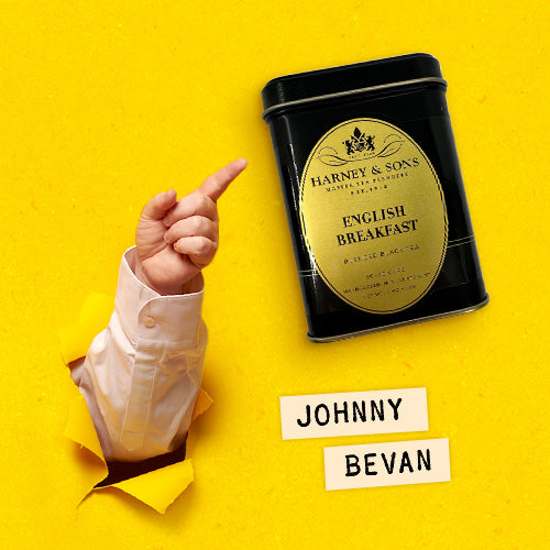 Johnny Bevan with Harney & Sons English Breakfast tea, finger pointing upward