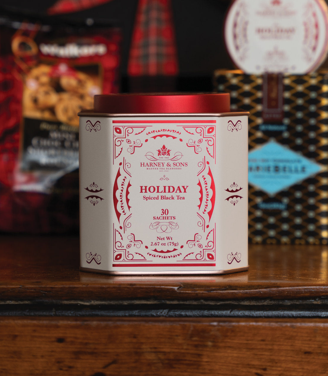 Tin of 30 sachets of Harney & Sons Holiday Spiced Black Tea, featuring festive red and cream packaging.
