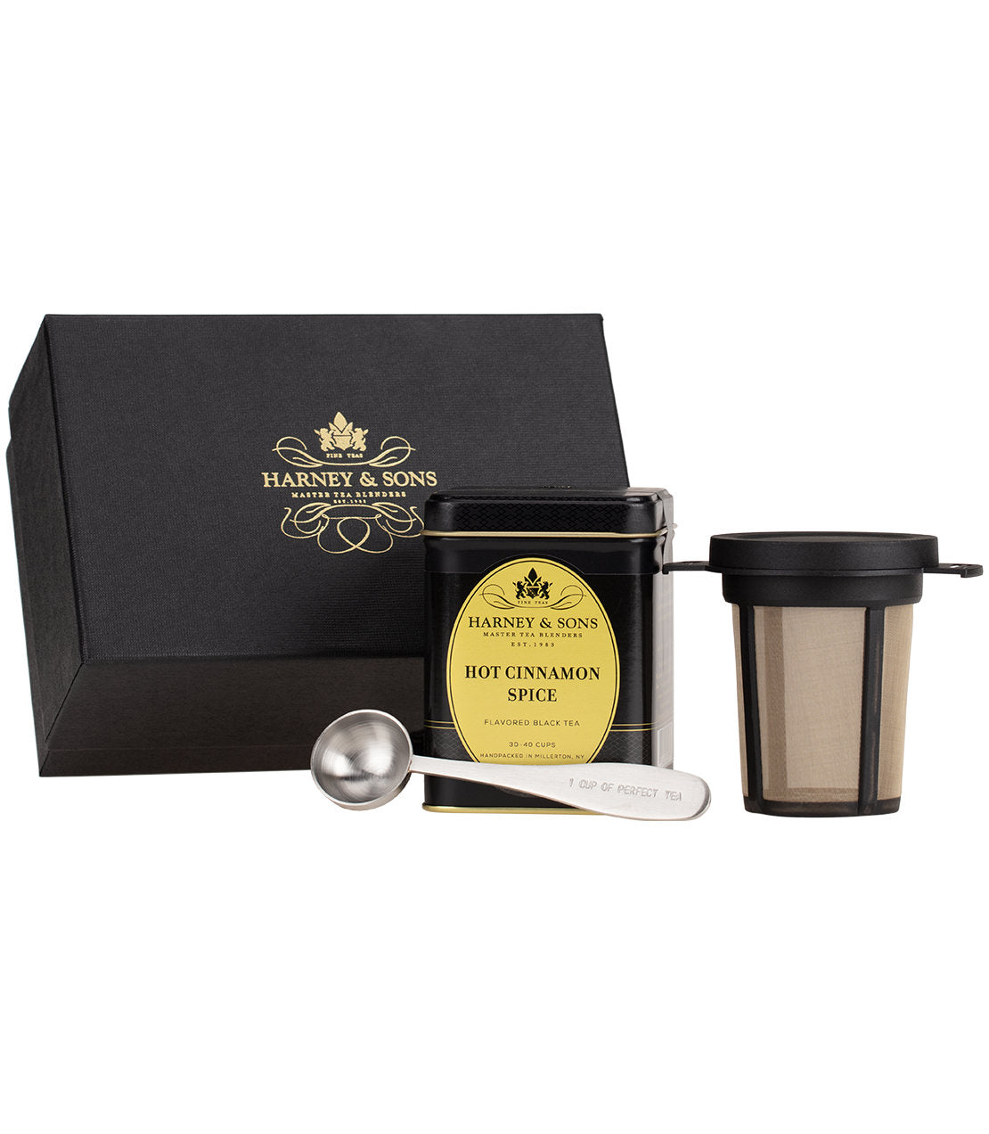Harney & Sons Finest Tea Starter Kit featuring Hot Cinnamon Spice tea, infuser, and measuring spoon in a gift box.