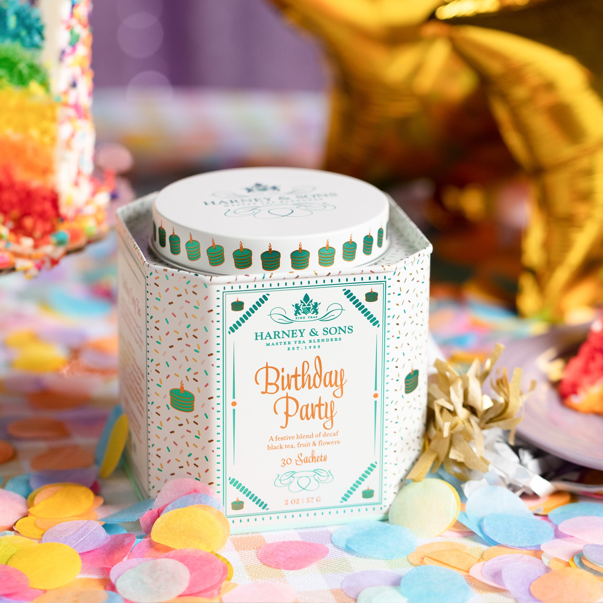 "Harney & Sons Birthday Party tea tin with 30 sachets, decorated with colorful confetti and cake.