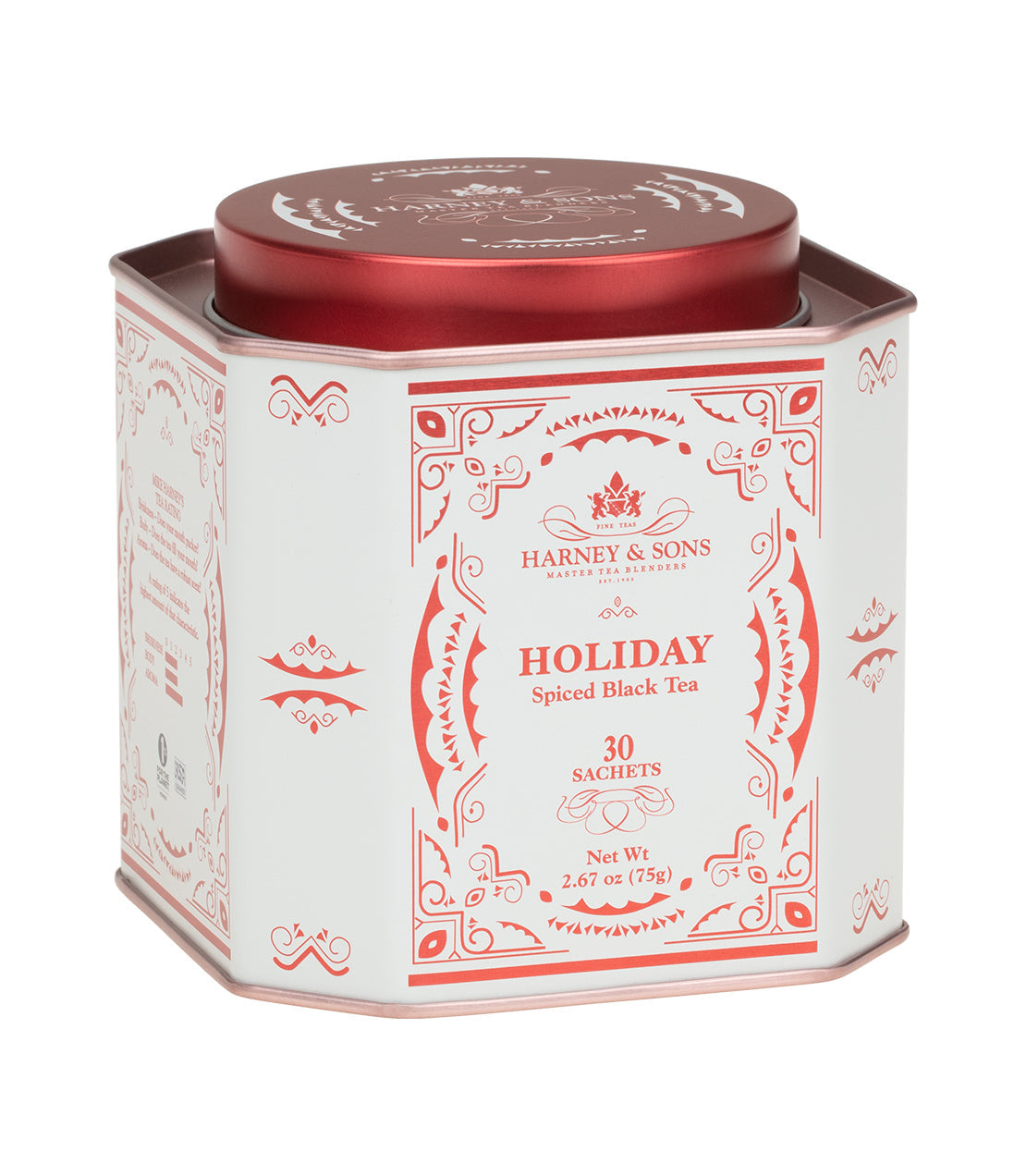 Holiday Tea tin featuring spiced black tea sachets, elegantly designed with festive red and white packaging.