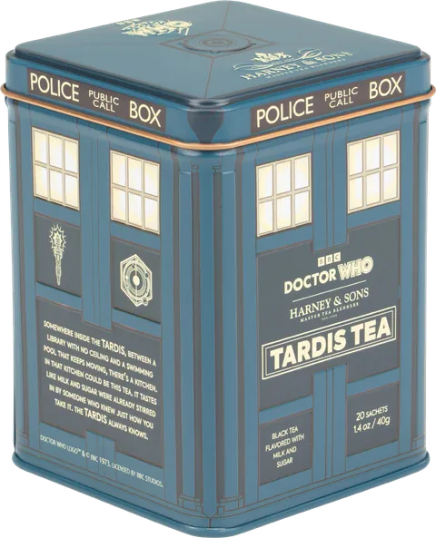 A Doctor Who Tardis Tea tin canister shaped like the blue TARDIS police box, with visible Doctor Who and Harney & Sons branding and tea text on the front.
